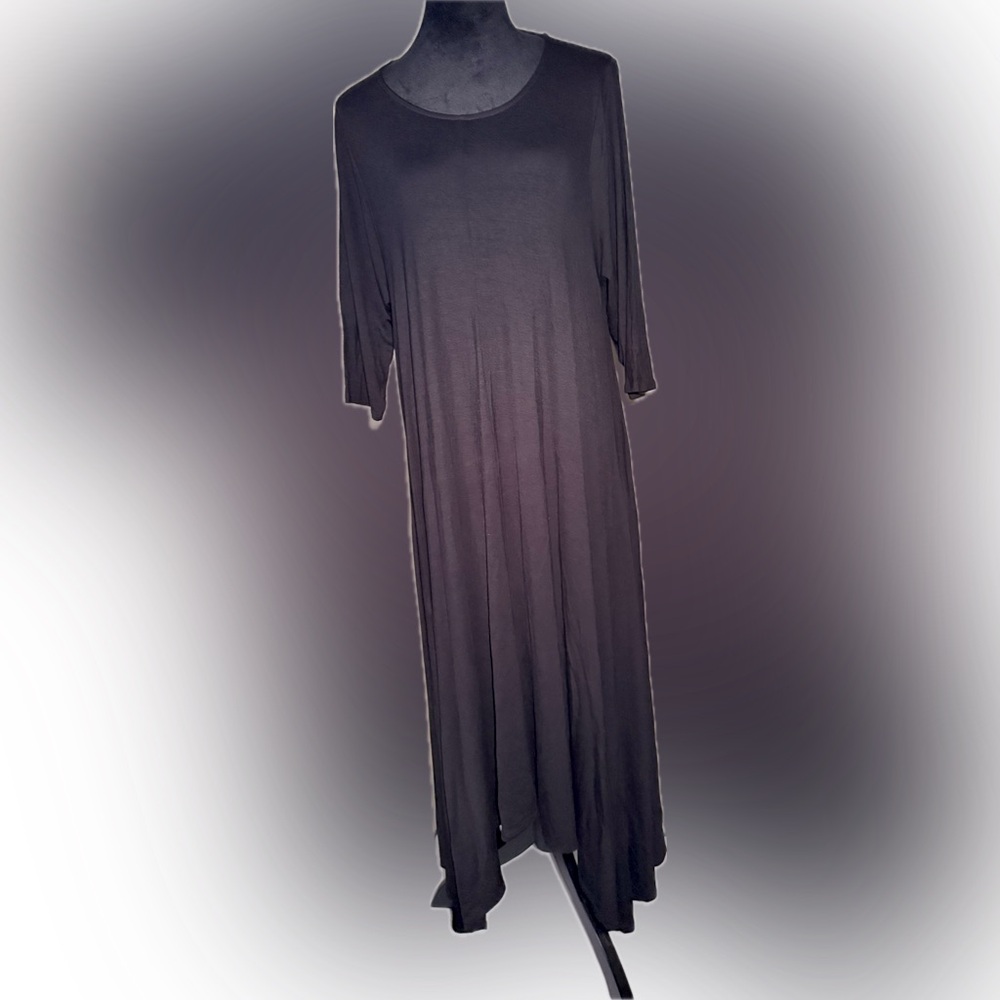 Black Maxi Dress by 12ami; 3/4 sleeves, side pocket’s & asymmetrical hem size XL